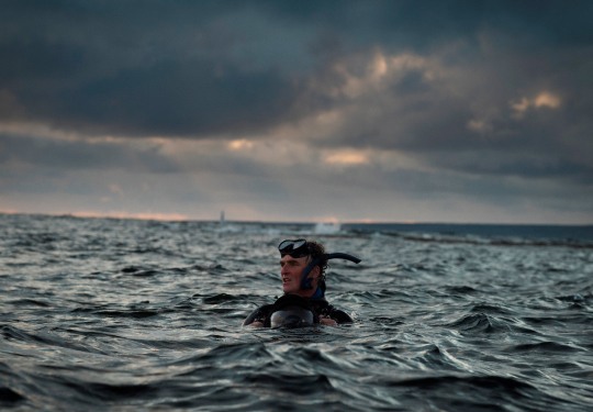 Person Swimming with Snorkel