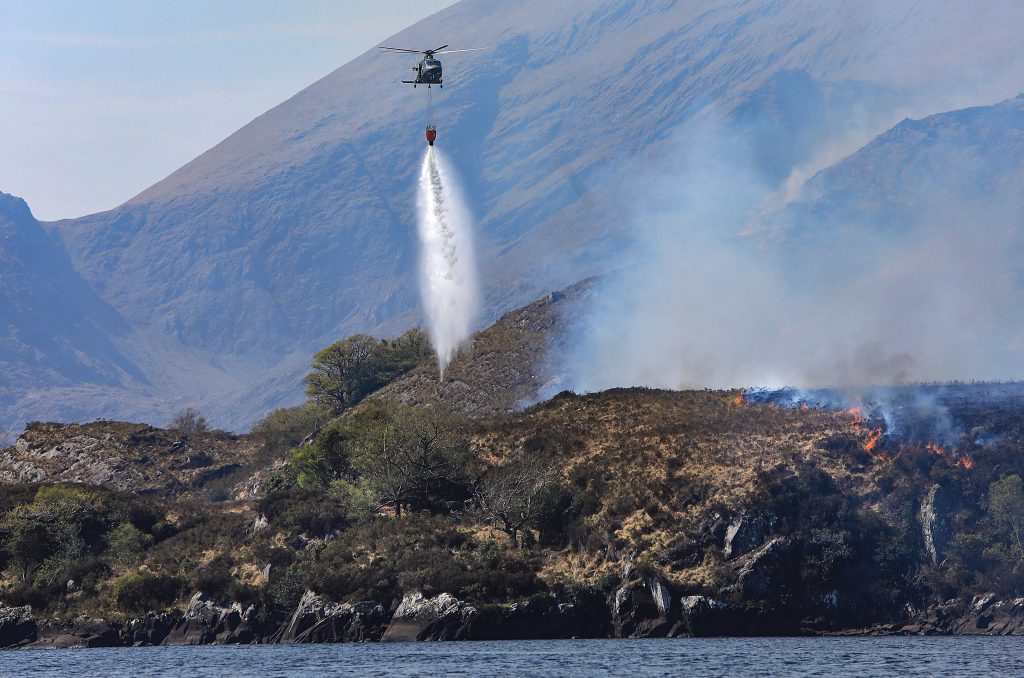 Helicopter putting out fires in Killarney National Park
