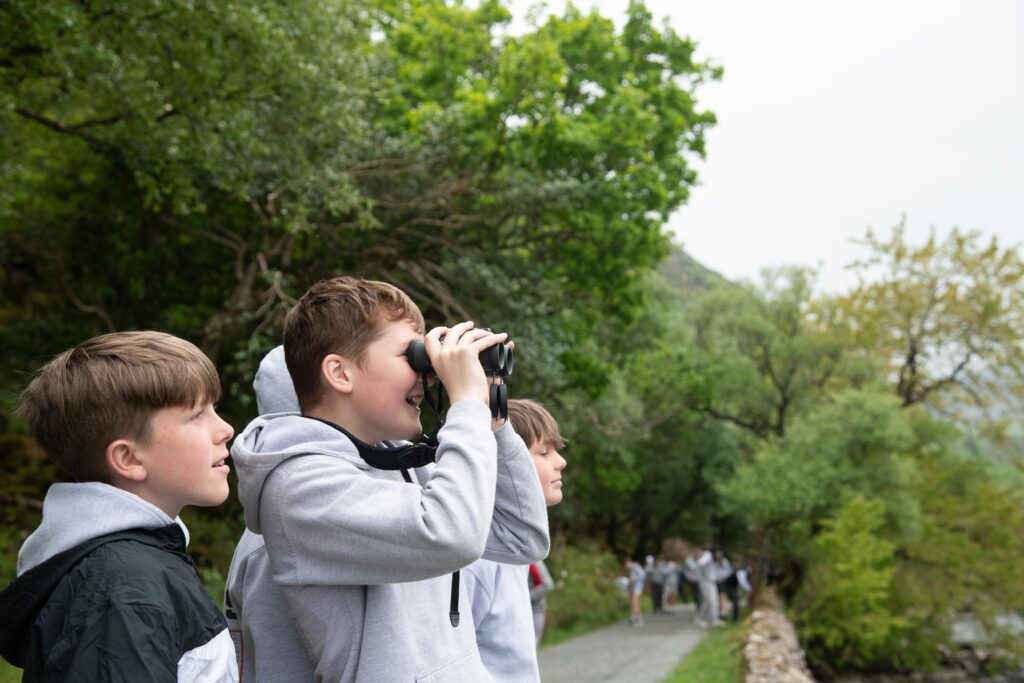 Students with binoculars