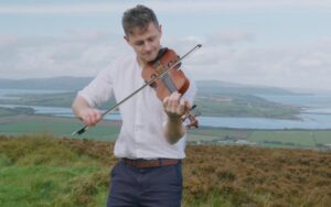 Jack Houston is playing violin